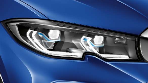 BMW 3 серии Седан (G20), лазерные фары BMW Laserlight. BMW 3 серии Седан (G20), лазерные фары BMW Laserlight. Боковой крупный план левой передней фары BMW Laserlight.