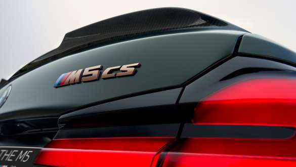 “M5 CS” model inscription BMW M5 CS F90 2021 “M5 CS” model inscription BMW M5 CS F90 2021 Frozen Deep Green metallic close-up tailgate