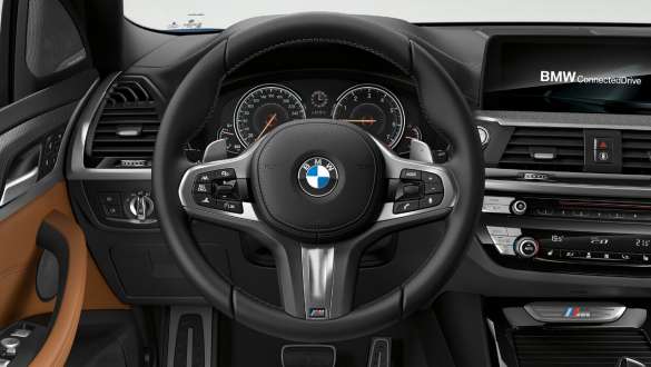 BMW X3 M40i и BMW X3 M40d, кожаный руль M. BMW X3 M40i и BMW X3 M40d, салон, кабина с кожаным рулем M.