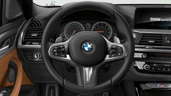 BMW X3 M40i и BMW X3 M40d, спортивное рулевое управление. BMW X3 M40i и BMW X3 M40d, салон, кабина, кожаное рулевое колесо M, спортивное рулевое управление.
